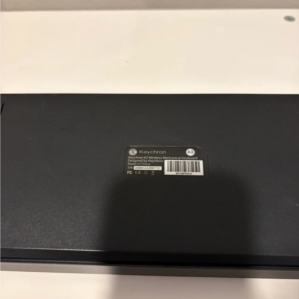 Compact Gray Mechanical Keyboard with Orange Accent